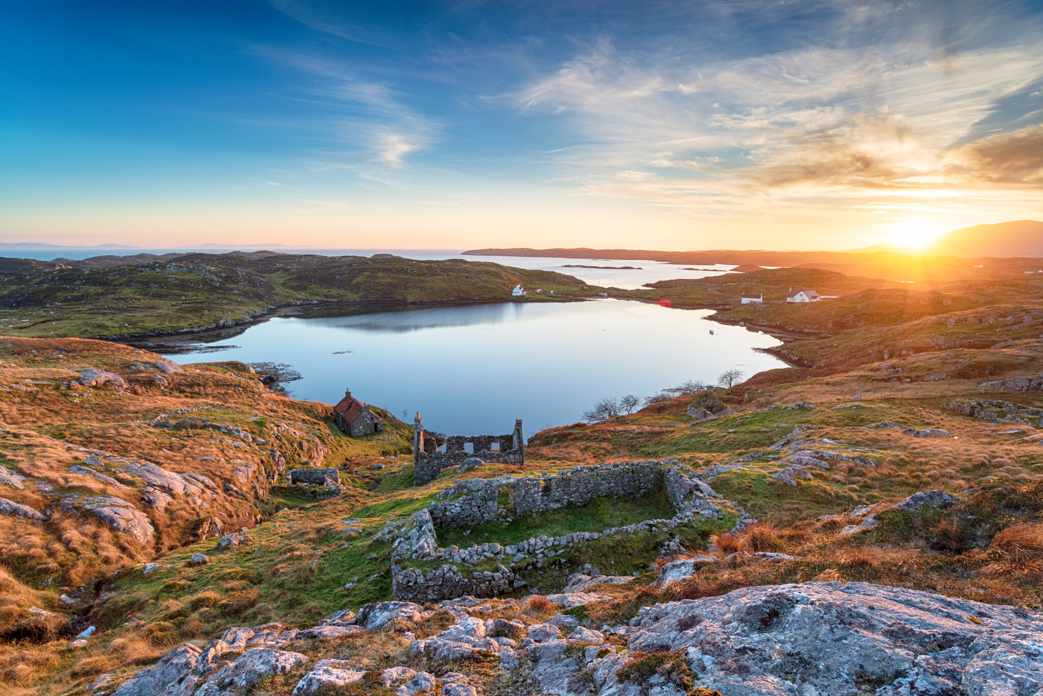 Stunning sunset over ruins at manish on the Isle of Harris in the Outer Hebrides of Scotland
