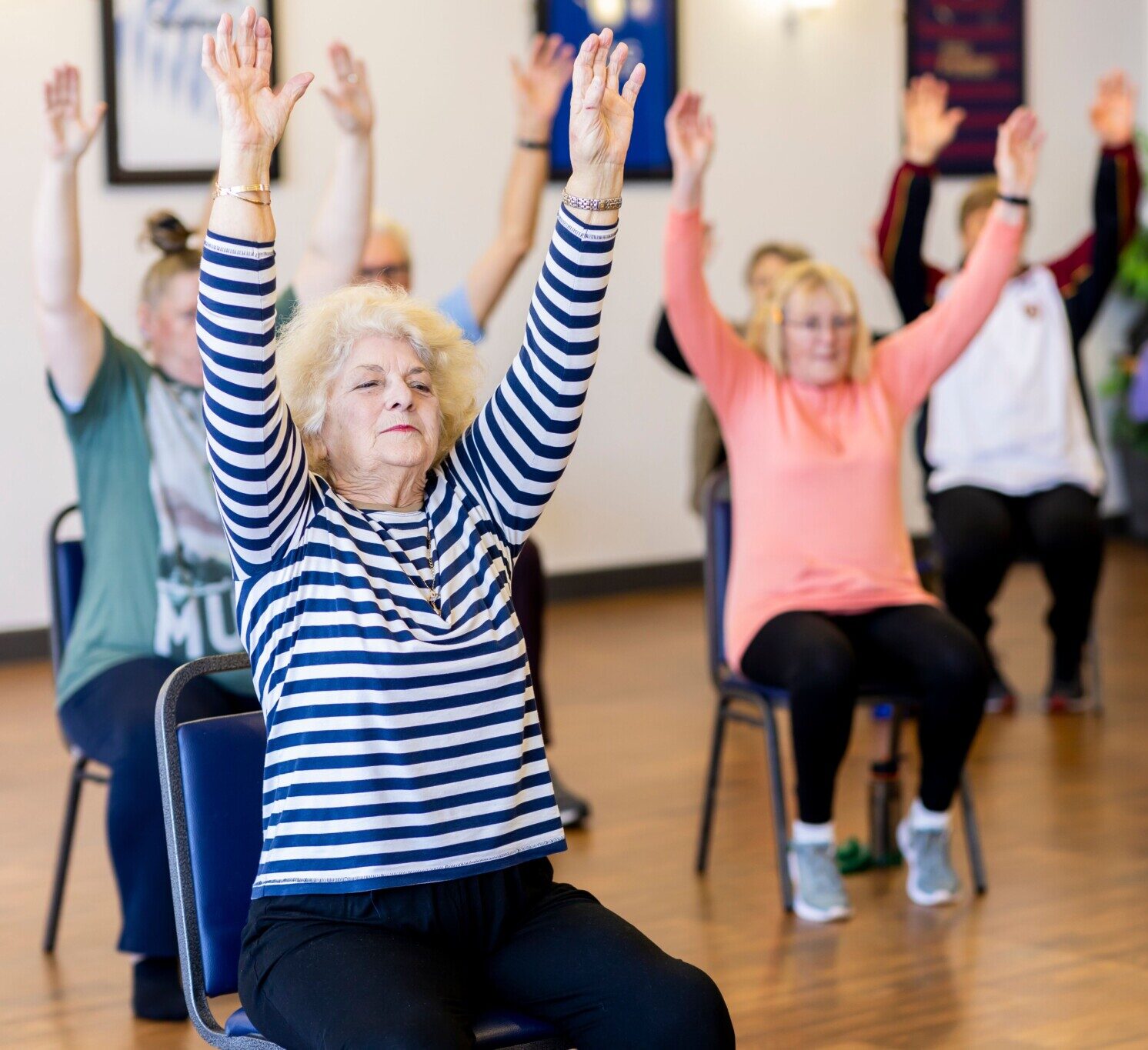 people doing chair exercise